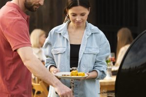 medium-shot-couple-cooking-together